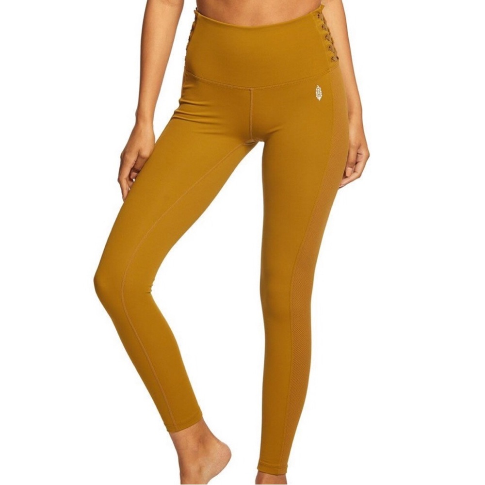 FREE PEOPLE Movement before you go leggings size small khaki high rise Lace Up